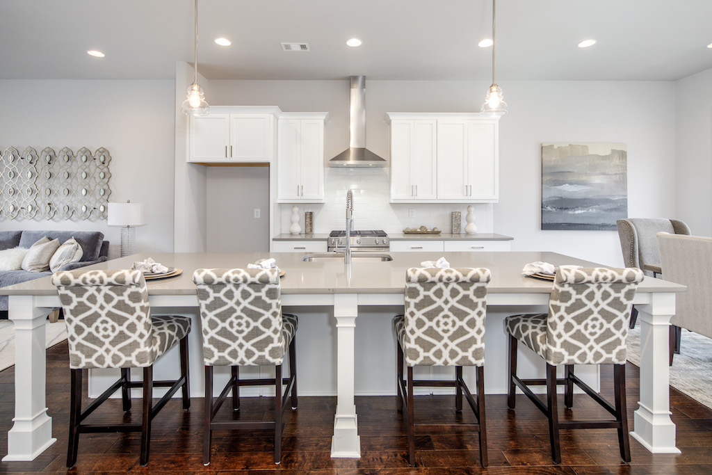 Add a few chairs or bar stools to your island for an additional dining area in your new home.