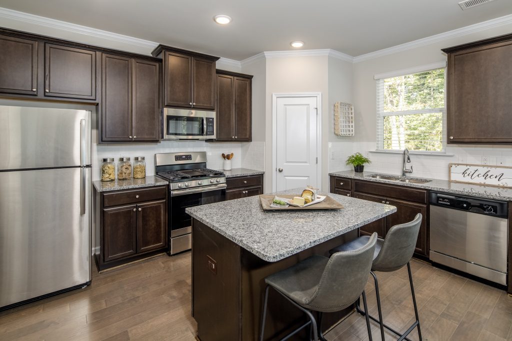 A kitchen layout you'll find in High Grove townhomes