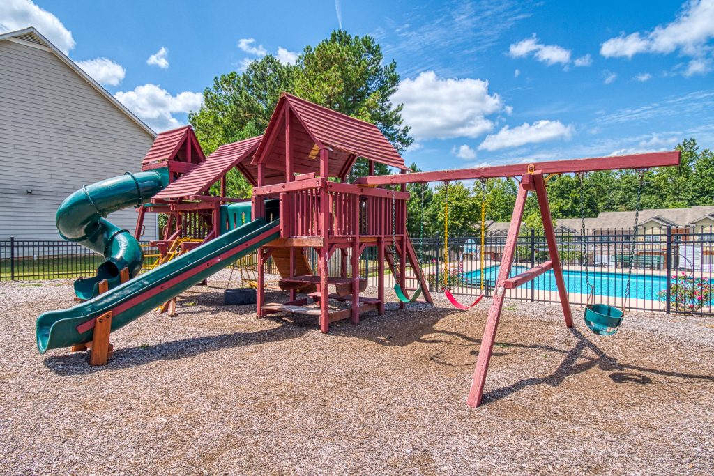 Playground area near community pool - High Grove has quality amenities