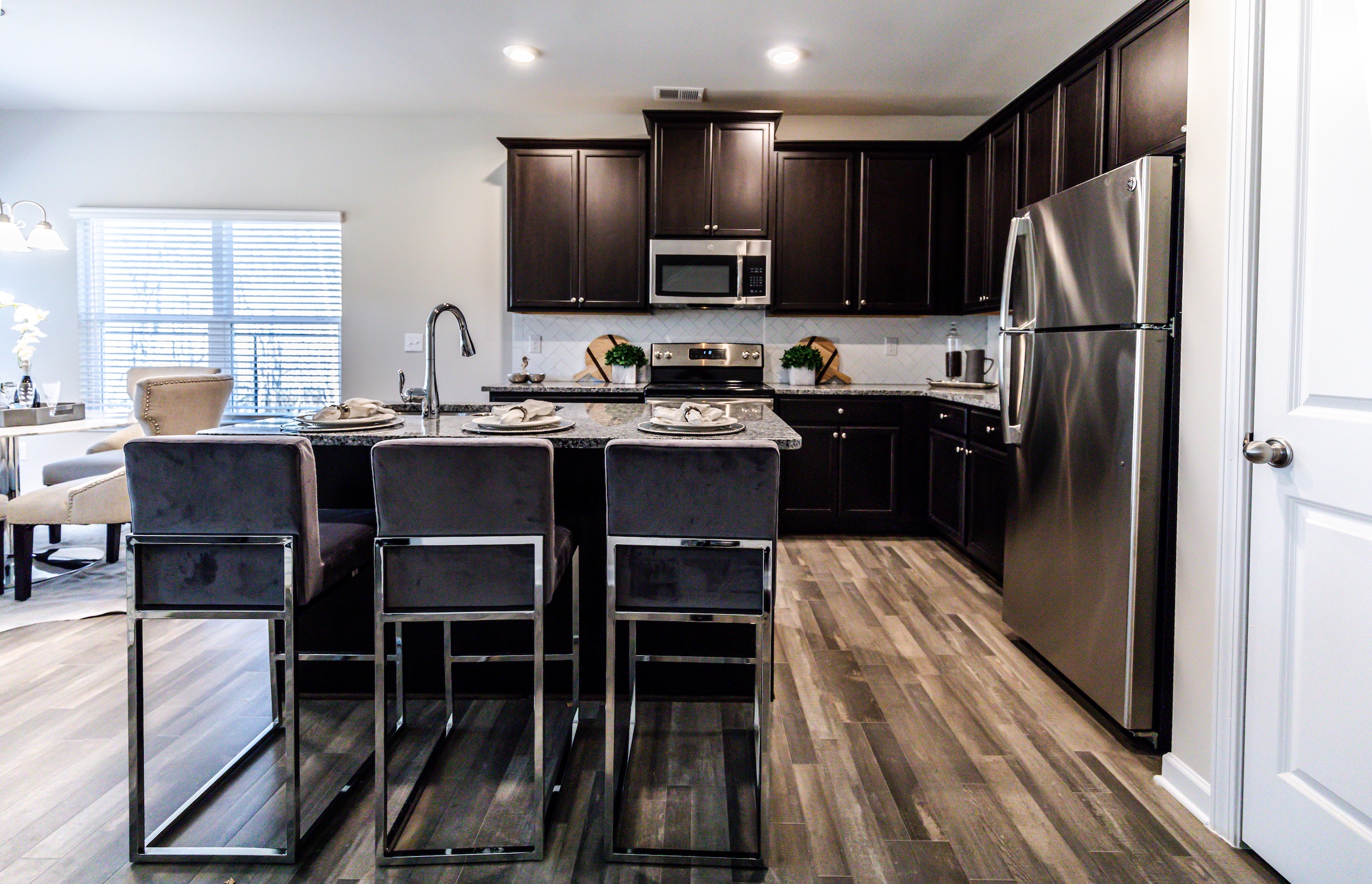 Open concept kitchen with many features at High Grove