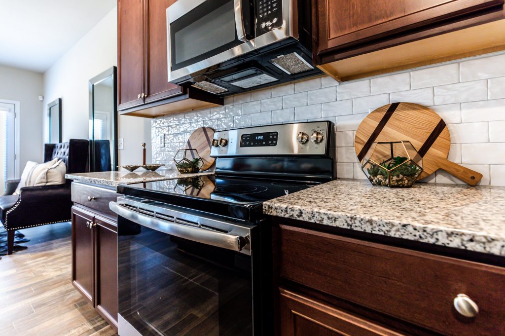 the kitchen in the model at High Grove