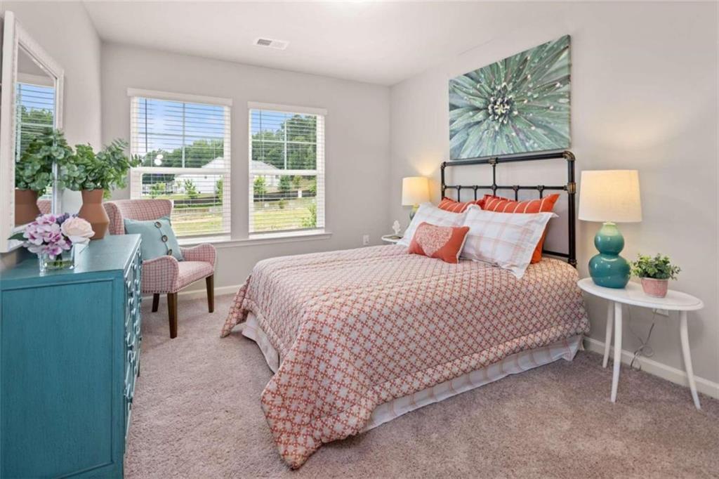 A secondary bedroom in the new homes in Atlanta at Pinnacle Point