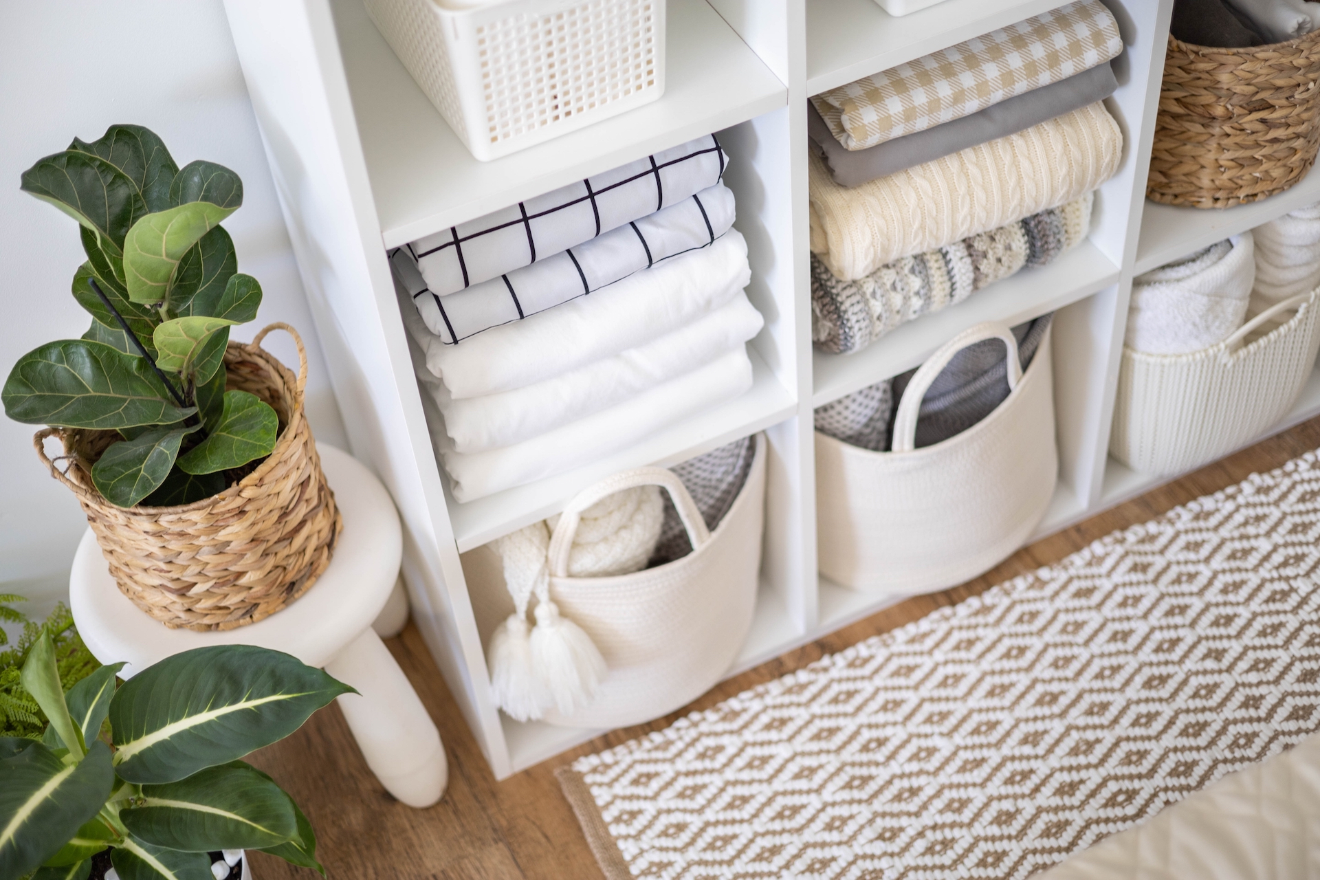 Declutter your home for spring and use bins and baskets to store items ©Kostikova Natalia