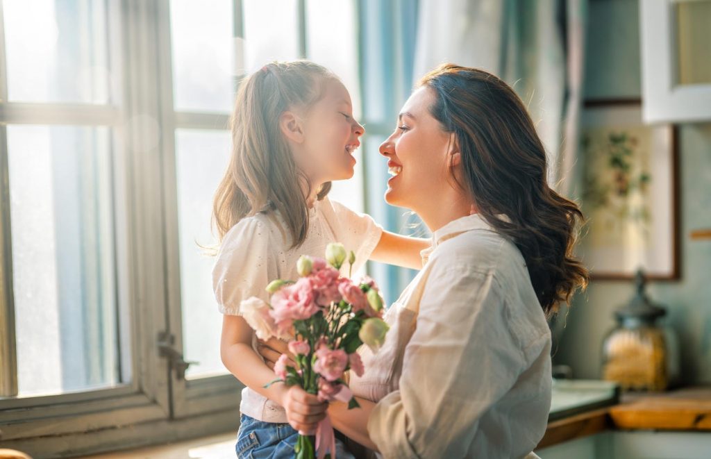 mom and daughter with flowers ©Yuganov Konstantin
