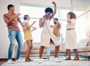 family having a dance party in the living room ©YuriArcursPeopleimages