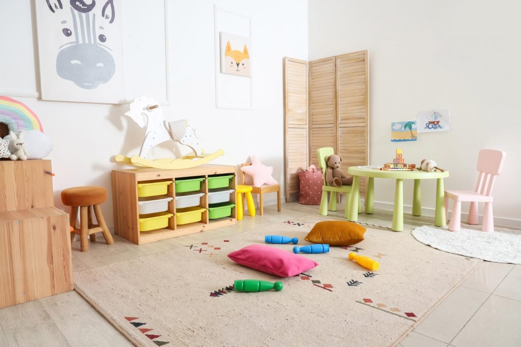  Basement playroom with area rug and toy storage for kids
©Pixel-Shot