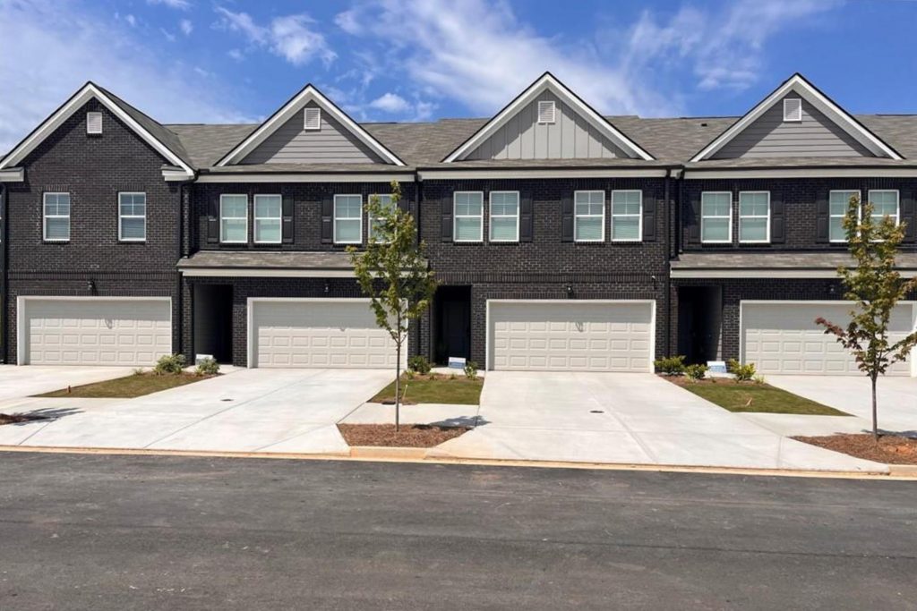 Exterior of a Rockhaven home at Reeves Park with black brick facade.