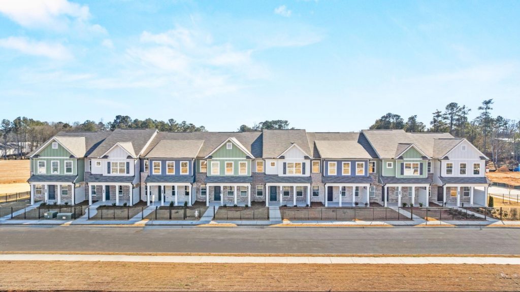 Row of modern townhomes in a planned community showing the type of neighborhood often managed by a homeowners association HOA
