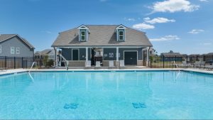 Community swimming pool amenity maintained by HOA in a residential neighborhood