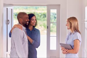 First-time homebuyers talking with a real estate agent about buying a home in Atlanta
©monkeybusiness