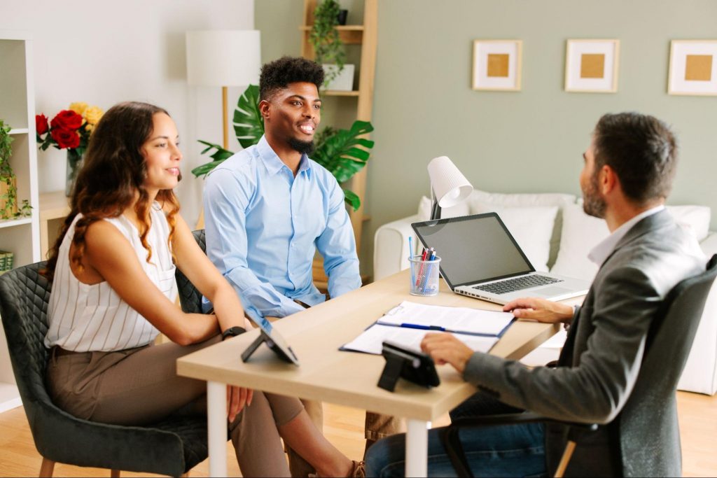 First-time homebuyers in Atlanta meeting with a mortgage lender to discuss financing options
©djile
