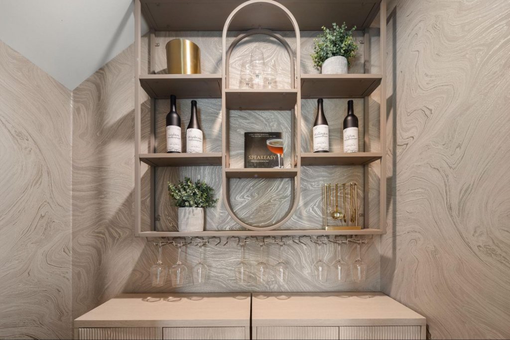 Built-in wet bar in a new construction Rockhaven home with custom shelving and modern finishes