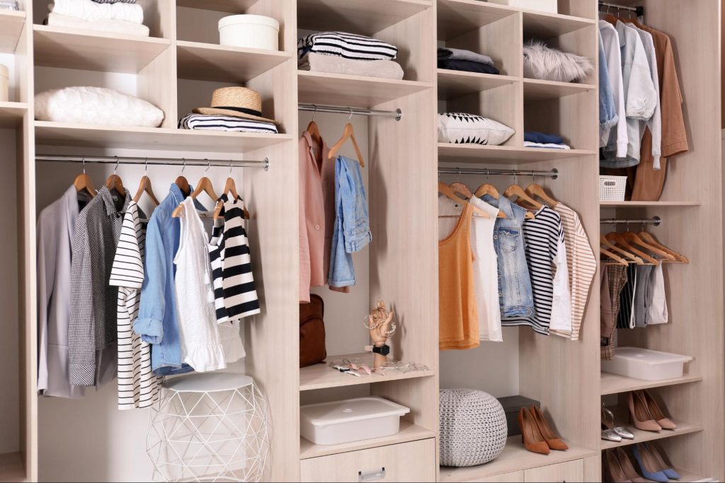 Custom walk-in closet system with built-in shelving and organized storage
© africaimages