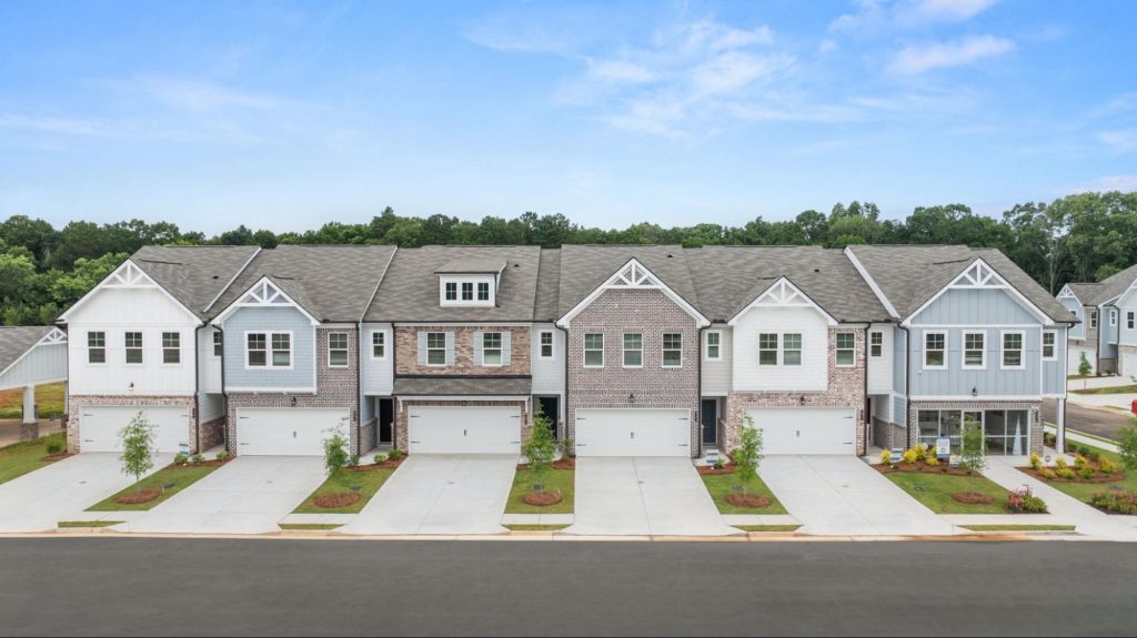 Exterior view of a row of brand-new, move-in ready townhomes by Rockhaven Homes in Metro Atlanta.